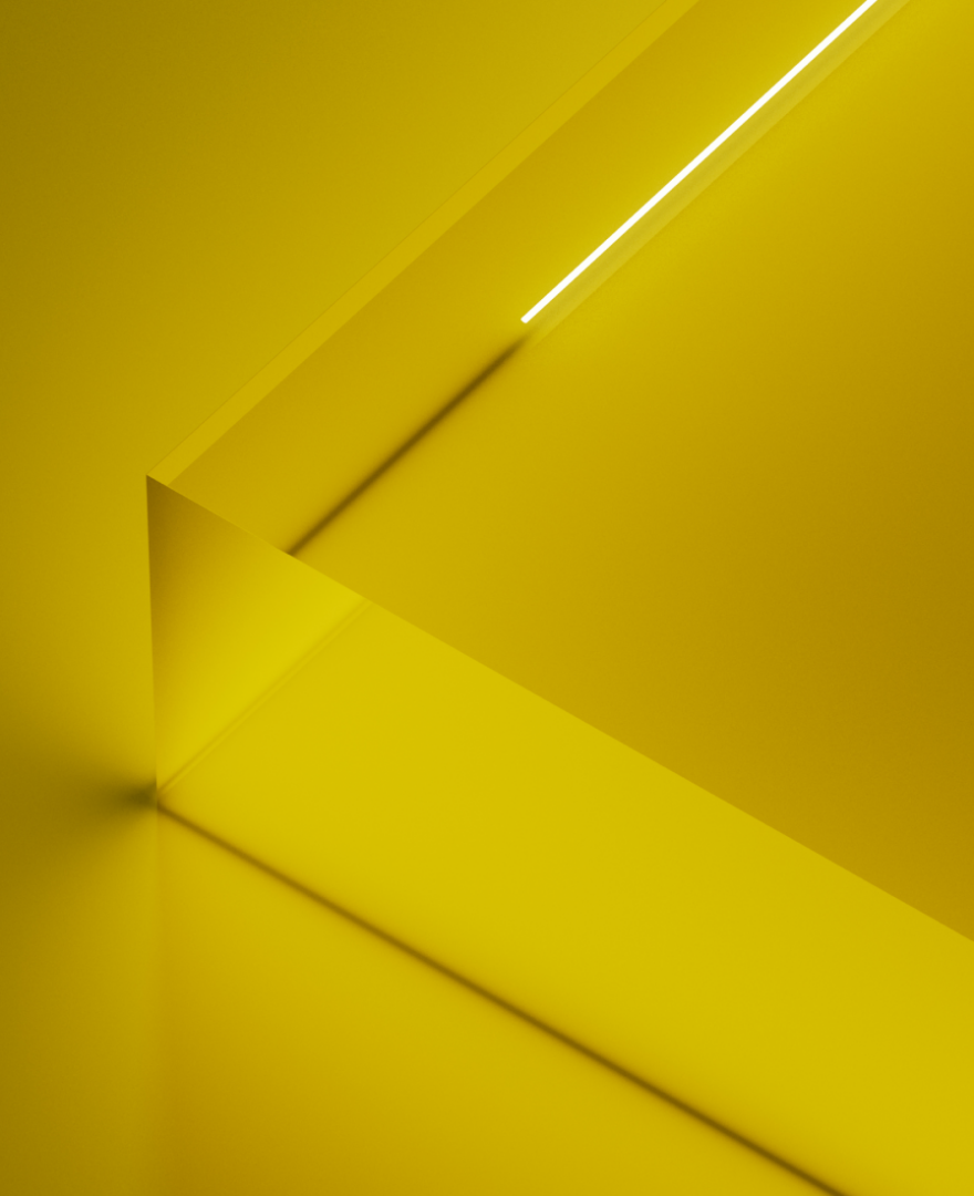 Corner of glass block on yellow background