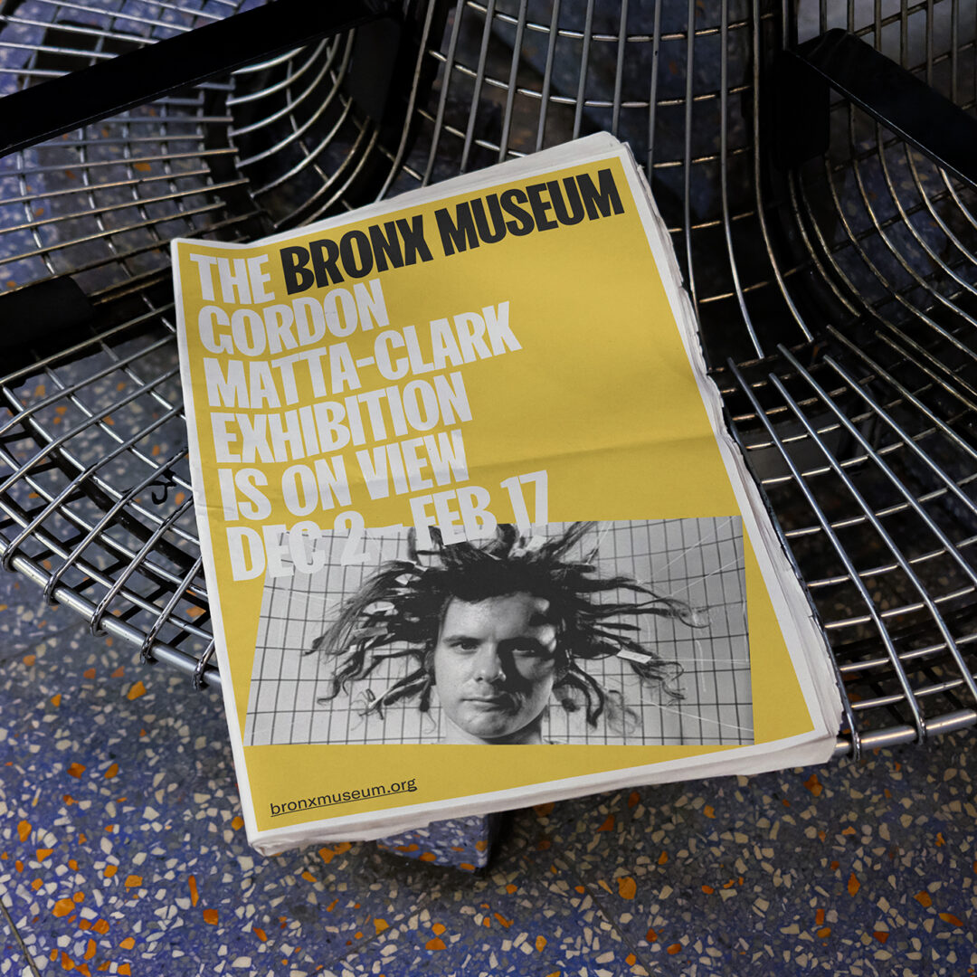 Yellow The Bronx Museum flyer on metal seat